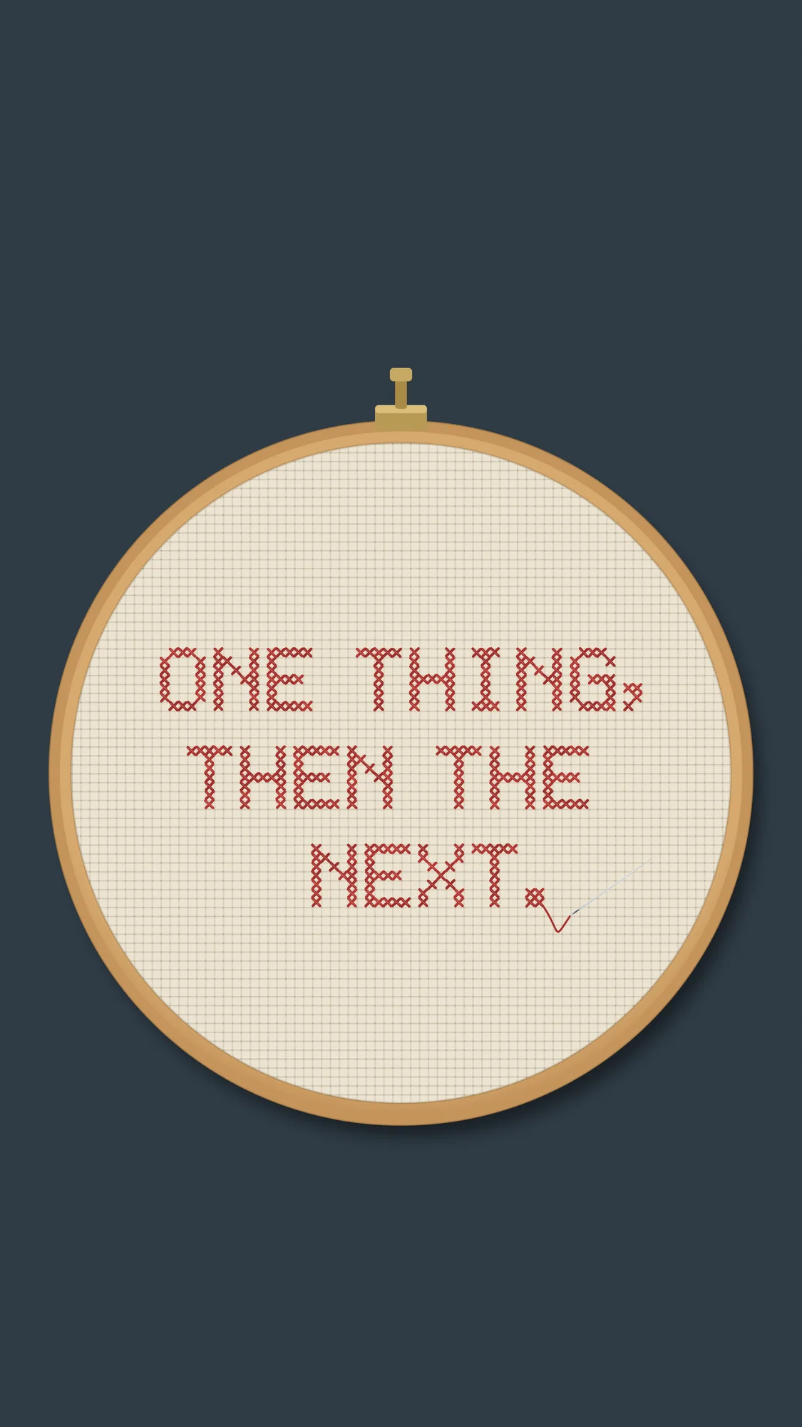 One Thing, Then the Next: A red cross-stitch, "ONE THING, THEN THE NEXT.", in a wooden embroidery hoop on slate, sized for the phone.