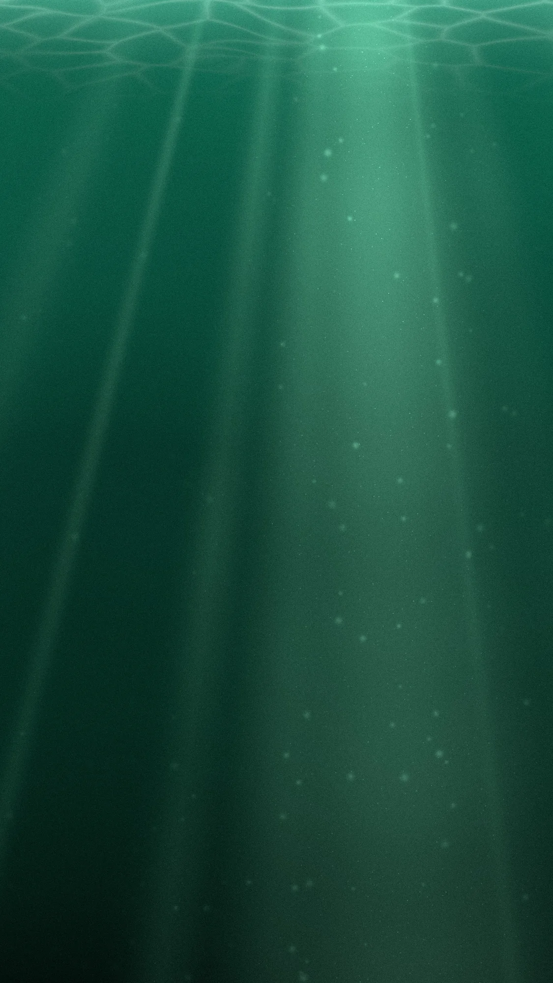 Emerald Depths: Emerald water lit from above: uneven light shafts slant down from the surface caustics, with particles drifting in the brightest beam.