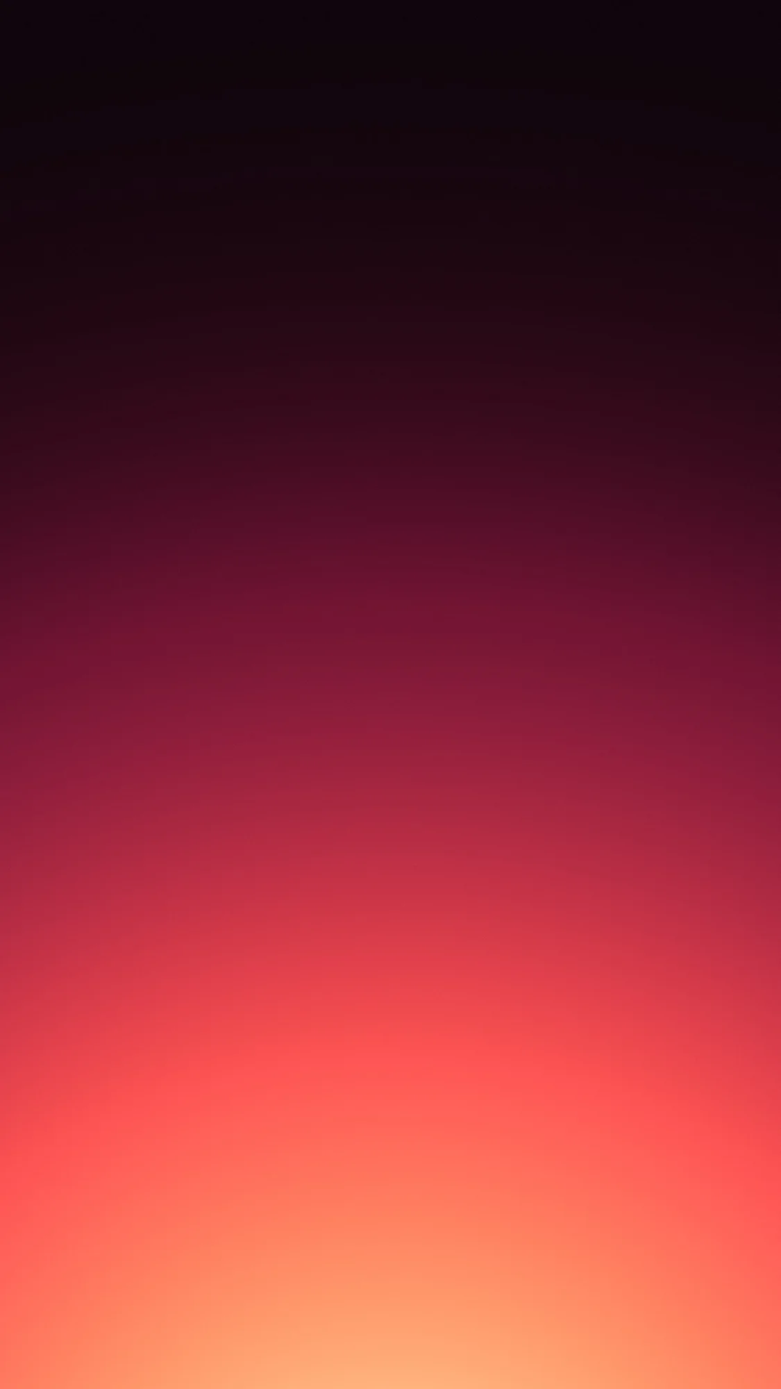 Coral Dusk: Dusky maroon sky glowing coral and apricot where it meets the bottom edge.